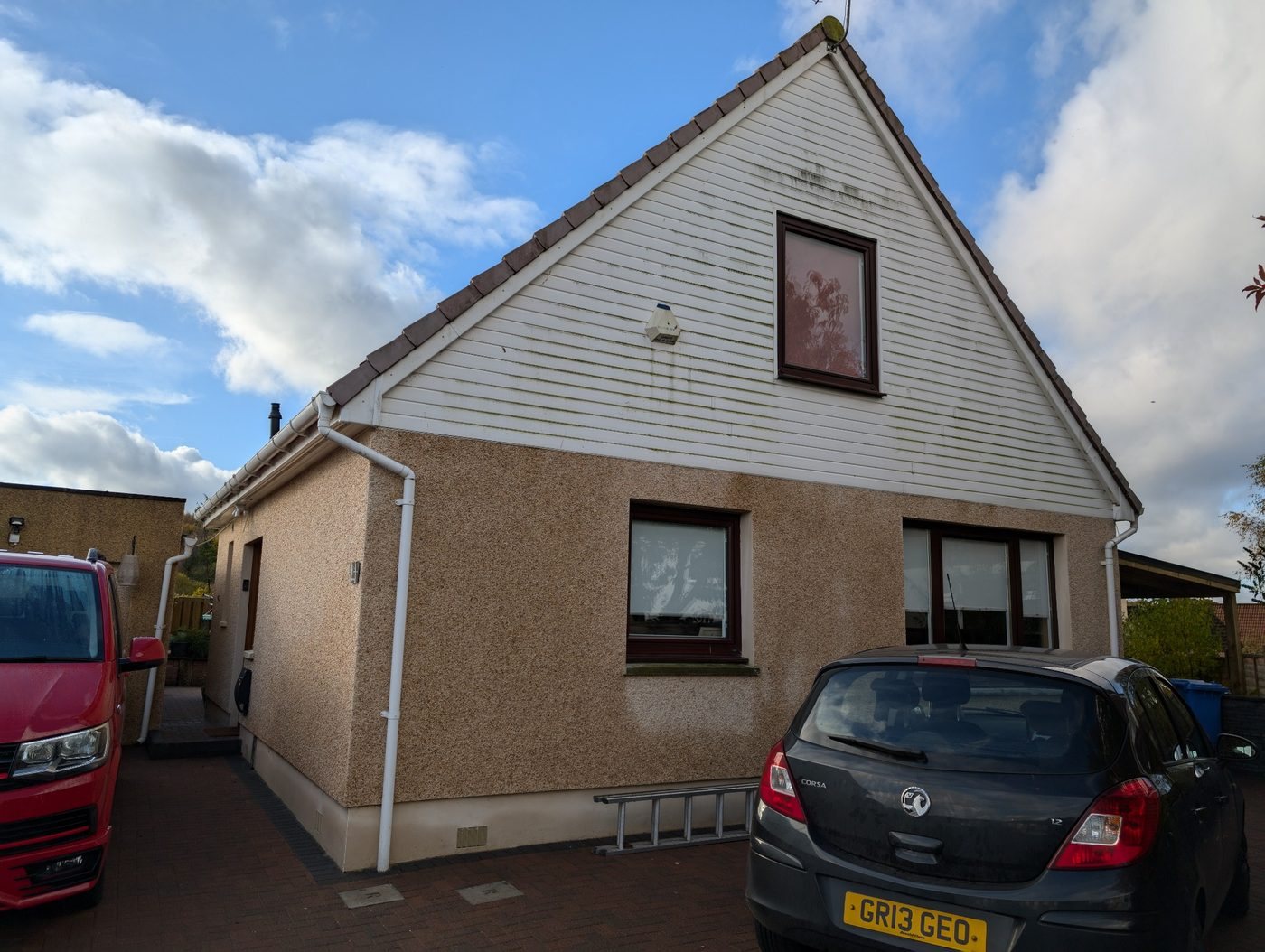 Exterior fascia and cladding before professional cleaning