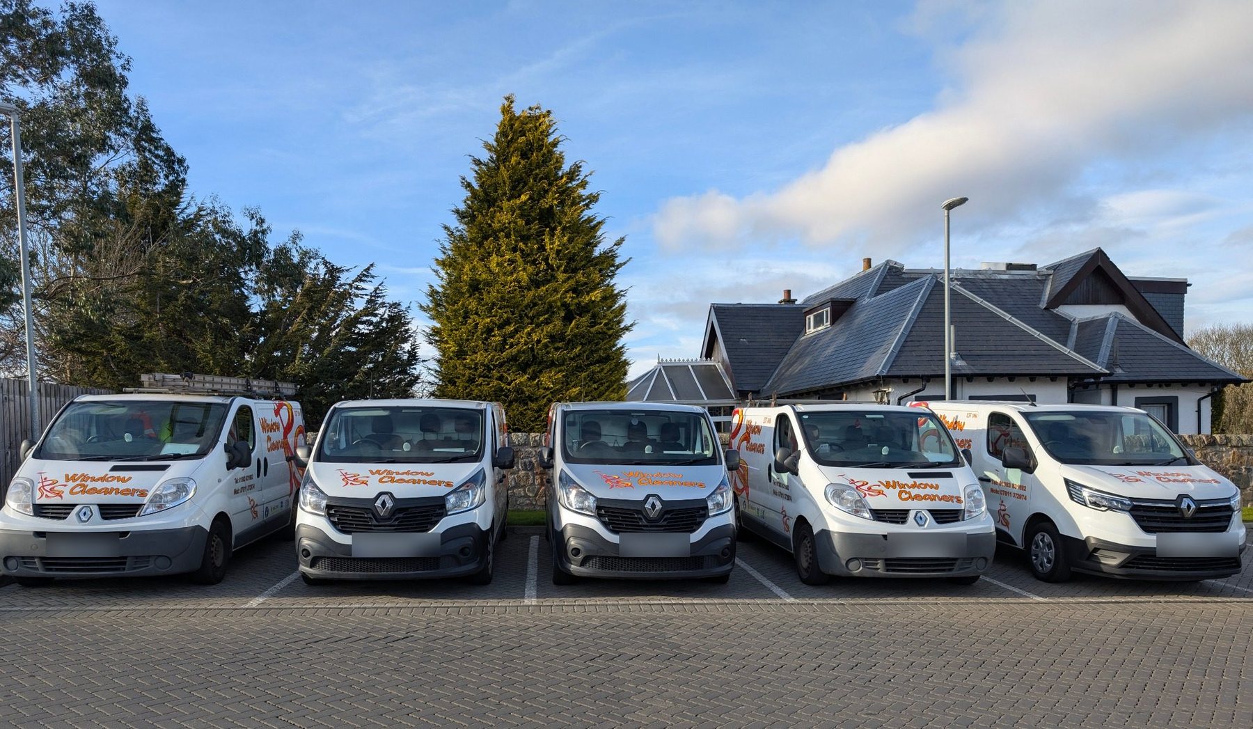 Five branded RS Window Cleaners vans serving Fife and Kinross